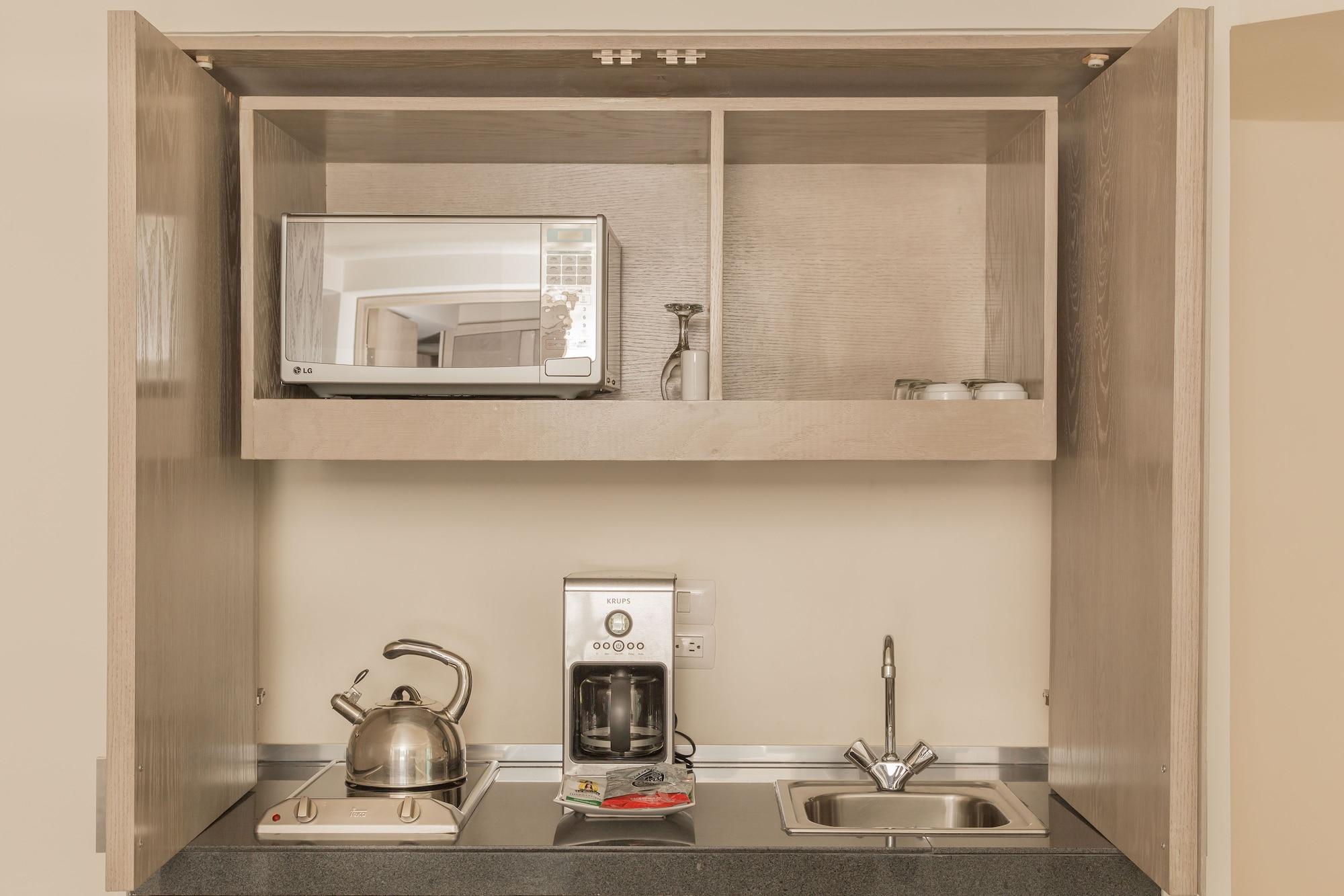 Suites Contempo Mexico Extérieur photo A typical kitchenette