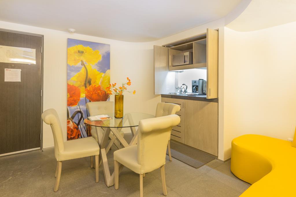 Suites Contempo Mexico Extérieur photo A typical apartment