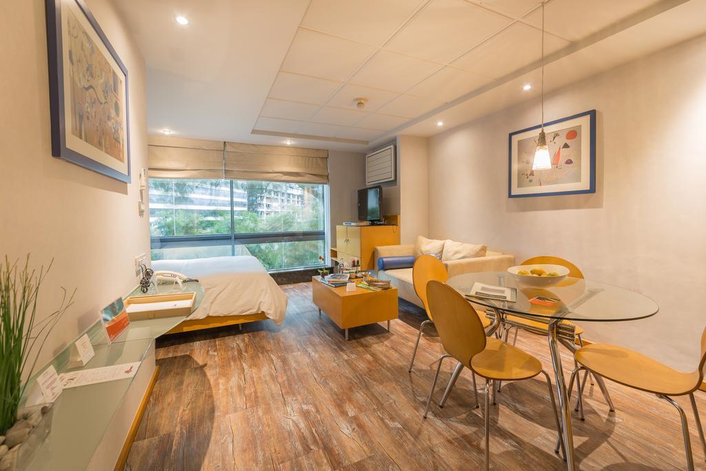 Suites Contempo Mexico Extérieur photo A typical studio apartment in Singapore