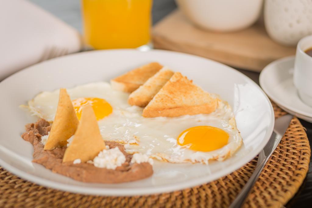 Suites Contempo Mexico Extérieur photo Fried eggs
