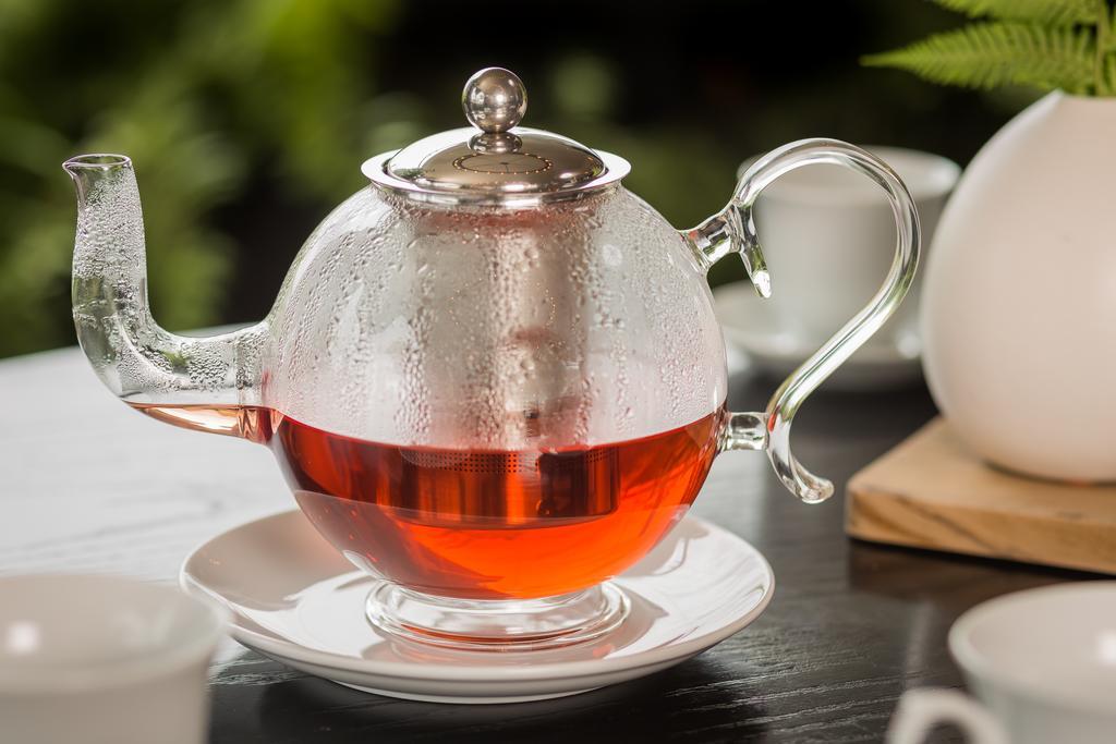 Suites Contempo Mexico Extérieur photo A glass teapot
