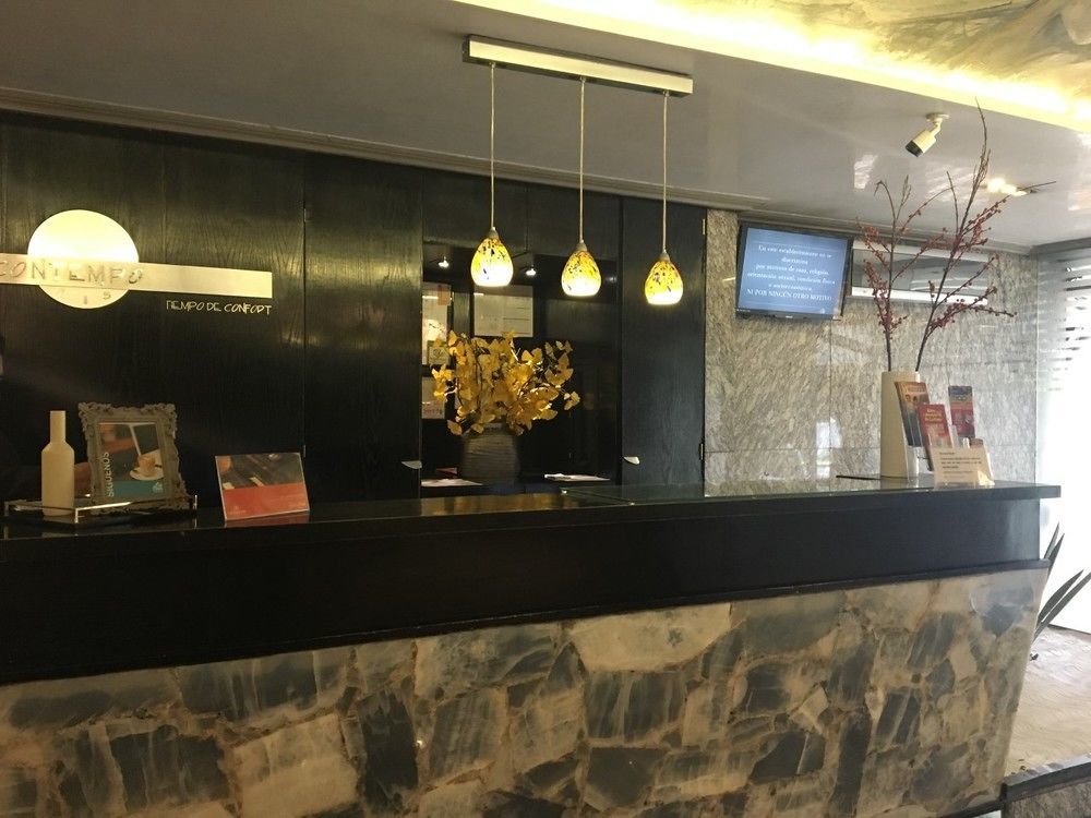 Suites Contempo Mexico Extérieur photo Reception desk at the hotel