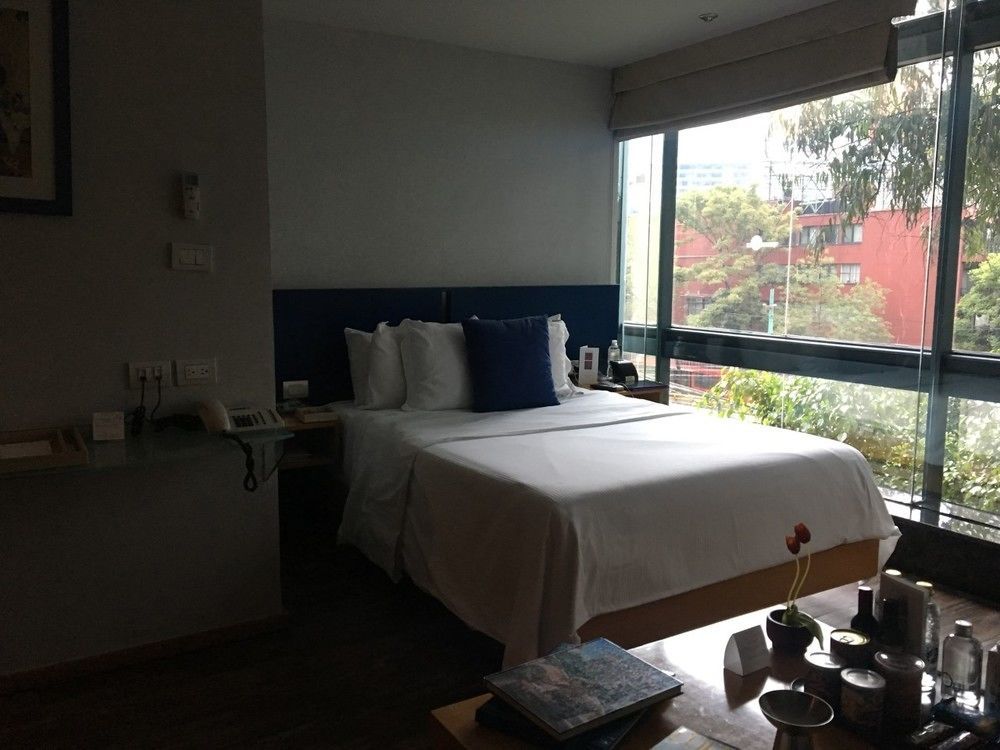 Suites Contempo Mexico Extérieur photo A bedroom at the hotel